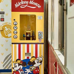 The colorful interior features a Mickey and Friends Picnic photo-taking area